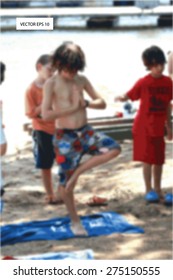 Slightly blurred background eps 10 vector image ittle boys doing yoga in the sand on a beach
