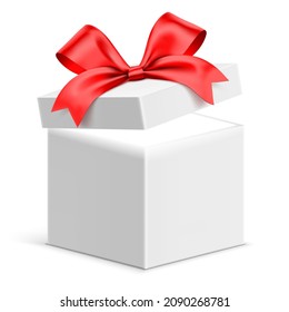 Slightly opened white gift box with red ribbon and mystery light shining from inside. Vector gift box isolated on background.