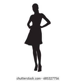 Slim sexy woman with long legs dressed in summer dresses and high heels standing with hands on her hips, isolated vector silhouette