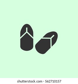 Slippers icon flat. Grey vector symbol on green background