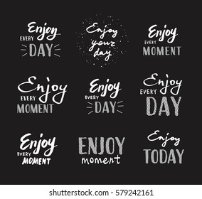 Slogan Enjoy every moment. Vector illustration on black background. Lettering. Enjoy every day. 