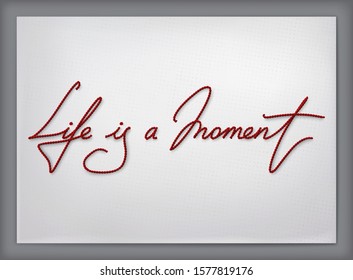 Slogan Life is a Moment as red wool thread with realistic shadow in vector. Hight detailed phrase from wool letters on white cardboard or paper template. 