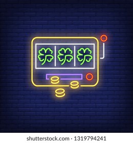 Slot machine with three clover leaves neon sign. Saint Patricks Day or casino design. Night bright neon sign, colorful billboard, light banner. Vector illustration in neon style.