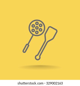 slotted spoon and a wooden spatula for frying icon