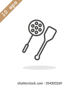 slotted spoon and a wooden spatula for frying icon