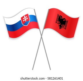 Slovak and Albanian crossed flags. Slovakia combined with Albania isolated on white. Language learning, international business or travel concept.