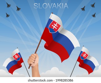 Slovak flags fluttering under the blue sky