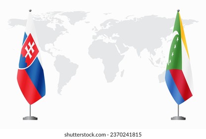 Slovakia and Comoros flags for official meeting against background of world map.