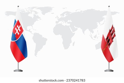 Slovakia and Gibraltar flags for official meeting against background of world map.