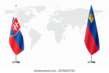 Slovakia and Liechtenstein flags for official meeting against background of world map.