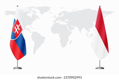 Slovakia and Monaco flags for official meeting against background of world map.