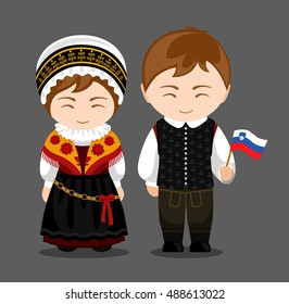 Slovenes in national dress with a flag. Man and woman in traditional costume. Travel to Slovenia. People. Vector flat illustration.