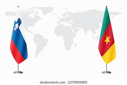 Slovenia and Cameroon flags for official meeting against background of world map.