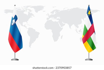 Slovenia and Central African Republic flags for official meeting against background of world map.