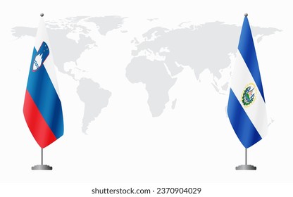 Slovenia and El Salvador flags for official meeting against background of world map.