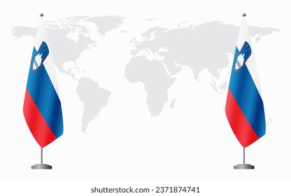 Slovenia and Slovenia flags for official meeting against background of world map.