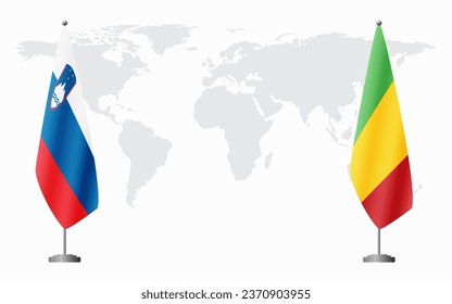 Slovenia and Mali flags for official meeting against background of world map.