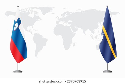 Slovenia and Nauru flags for official meeting against background of world map.