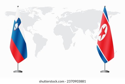 Slovenia and North Korea flags for official meeting against background of world map.