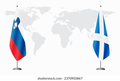 Slovenia and Scotland flags for official meeting against background of world map.
