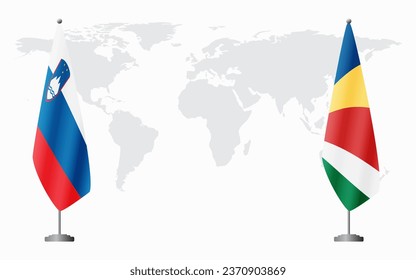 Slovenia and Seychelles flags for official meeting against background of world map.