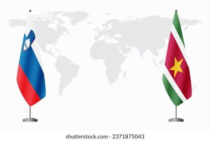 Slovenia and Suriname flags for official meeting against background of world map.