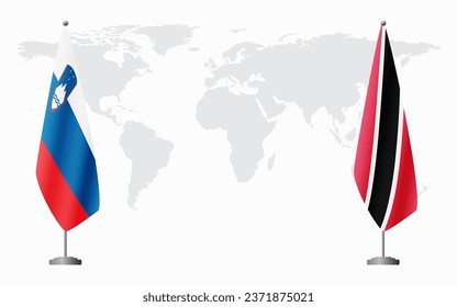 Slovenia and Trinidad and Tobago flags for official meeting against background of world map.