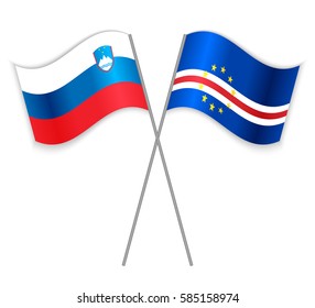 Slovenian and Cabo Verdean crossed flags. Slovenia combined with Cape Verde isolated on white. Language learning, international business or travel concept.