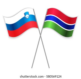 Slovenian and Gambian crossed flags. Slovenia combined with Gambia isolated on white. Language learning, international business or travel concept.