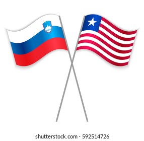 Slovenian and Liberian crossed flags. Slovenia combined with Liberia isolated on white. Language learning, international business or travel concept.