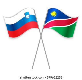 Slovenian and Namibian crossed flags. Slovenia combined with Namibia isolated on white. Language learning, international business or travel concept.