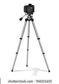 SLR camera on a tripod. Metal construction. Take a photo, movie or video