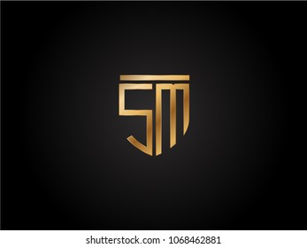 SM shield shape Letter Design in gold color