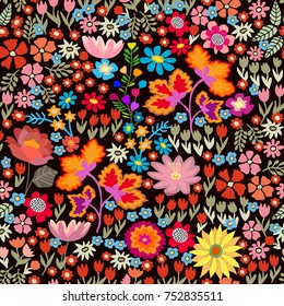 Small autumn flowers. Seamless vector pattern with asters, wildflowers,  tulips and sunflowers on black background. Folk art style textile collection.