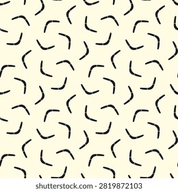 Small black boomerangs isolated on a white background. Monochrome seamless pattern. Simple flat vector graphic illustration. Texture.