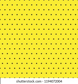 Small Black Polka Dots seamless pattern on a yellow background
