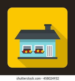 Small blue cottage icon in flat style on a yellow background