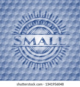 Small blue emblem with geometric pattern.