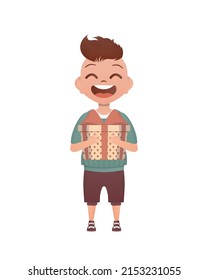 A small boy child is depicted in full growth and holds a box with a bow in his hands. Birthday, New Year or holidays theme. Isolated. Cartoon style.