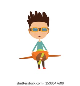Small Boy In Pilot Costume Dreaming Of Piloting The Plane, Playing With Toys Adorable Cartoon Characters.