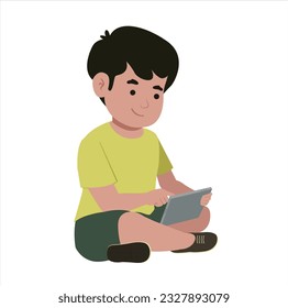 small boy using tablet and playing game on tablet he is happy because of online game  