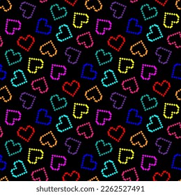 Small bright colorful multi-colored pixel hearts isolated on a black background. Cute seamless pattern. Vector simple flat graphic illustration. Texture.