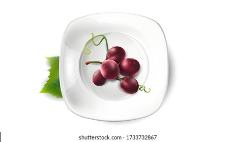 Small bunch of red grapes on a white plate.
