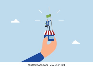 Small business idea, successful entrepreneur waving a victory flag in a small shop held by a gigantic hand. 