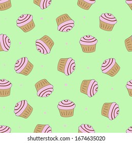Small cakes on a green background seamless pattern. 