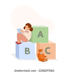 Small child reads book while sitting on wooden cubes with  alphabet. Reading nook in  classroom or library. Concept of learning, literacy. Vector illustration on isolated background. 