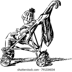 A small child is sitting in his stroller