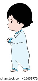 A small child standing looking at something. A small child walks