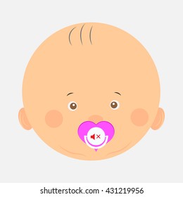 small child sucks a dummy