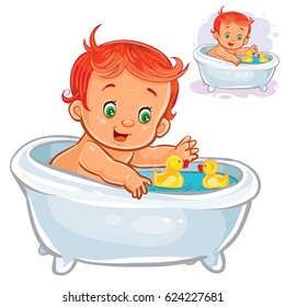 Small child take a bath with a rubber ducky isolated on white